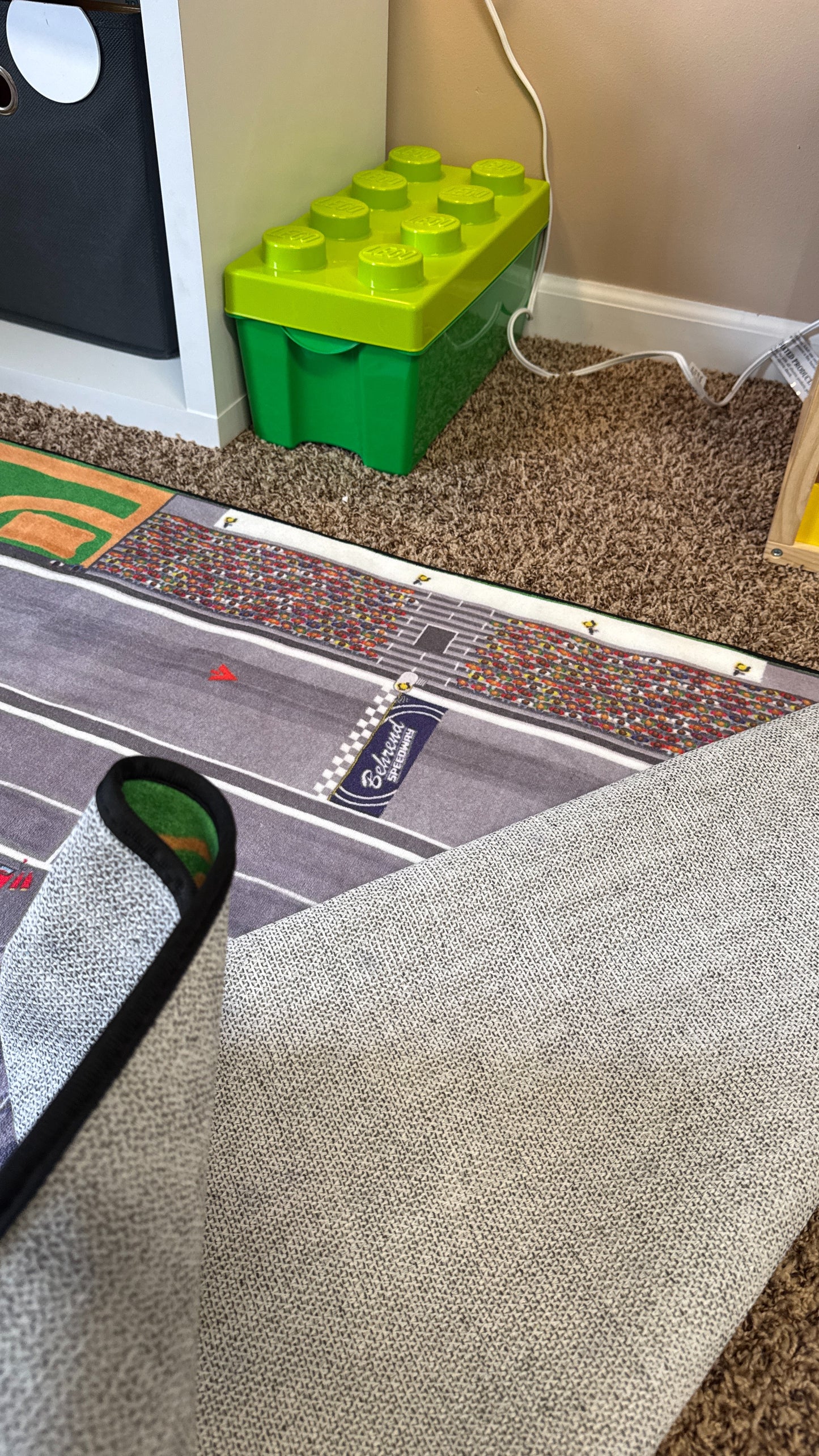 Close up of non-slip backing and stitched edge